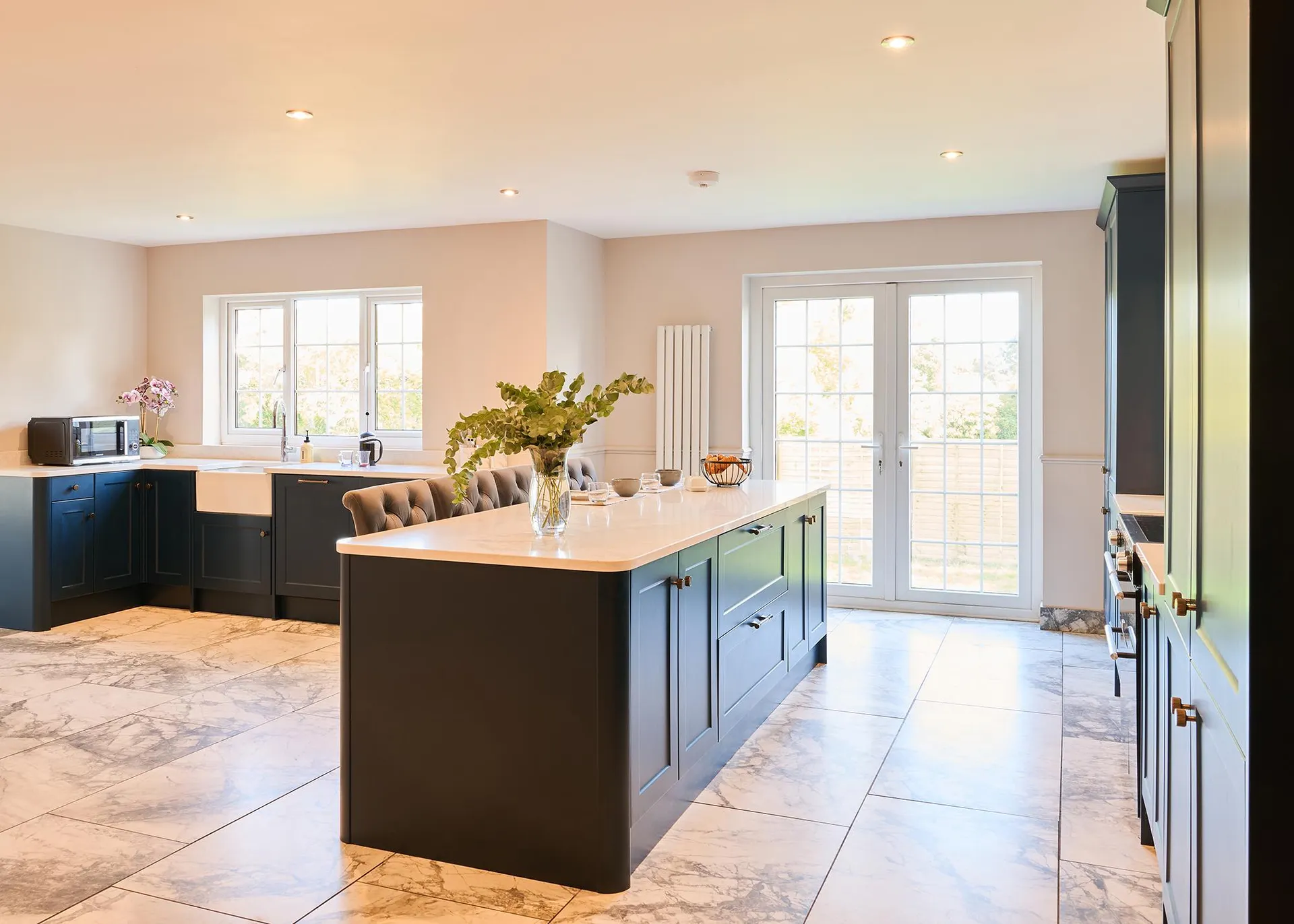 A wide view of the bungalow kitchen and dining area