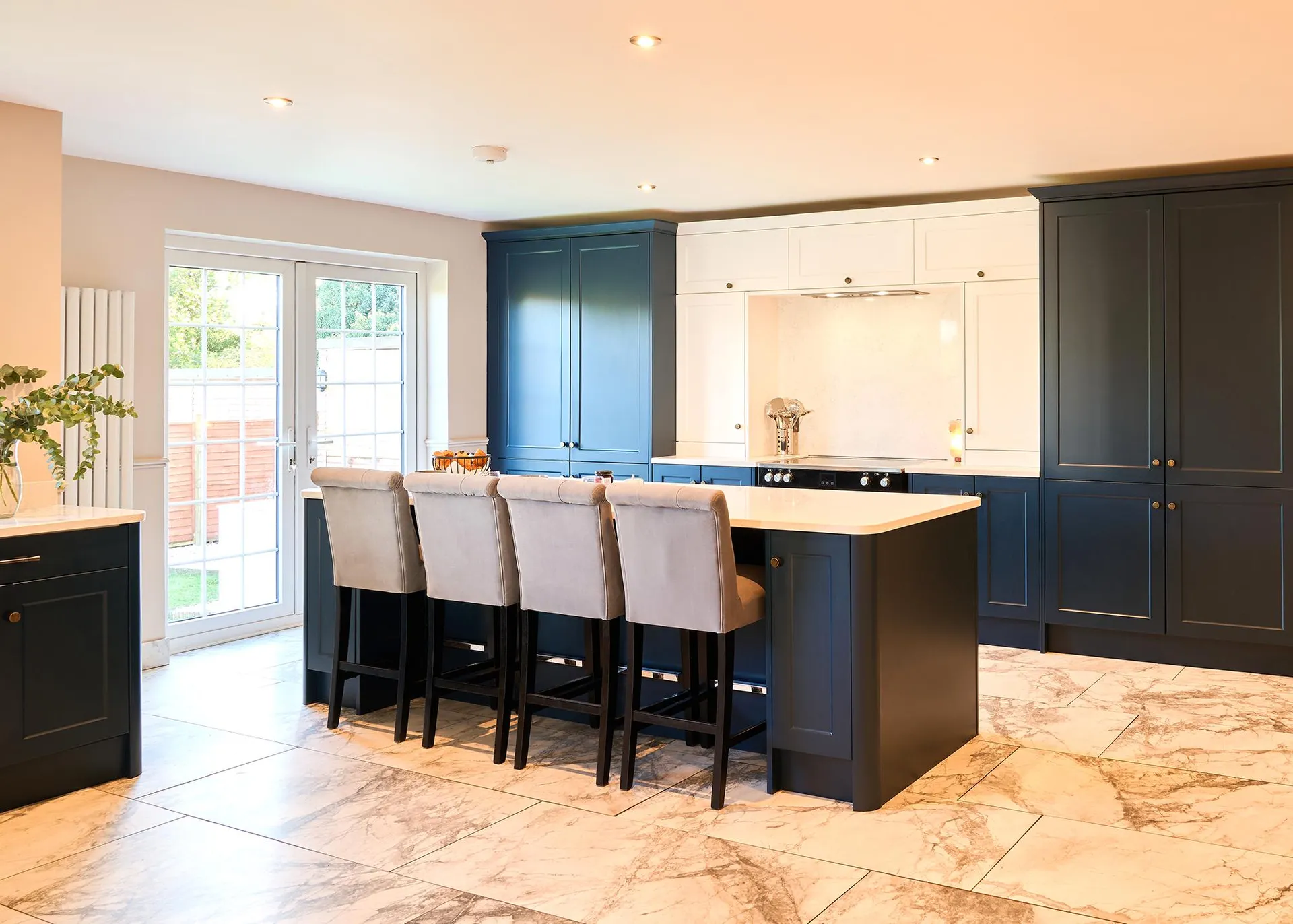 The kitchen and dining area with island seating in the bungalow